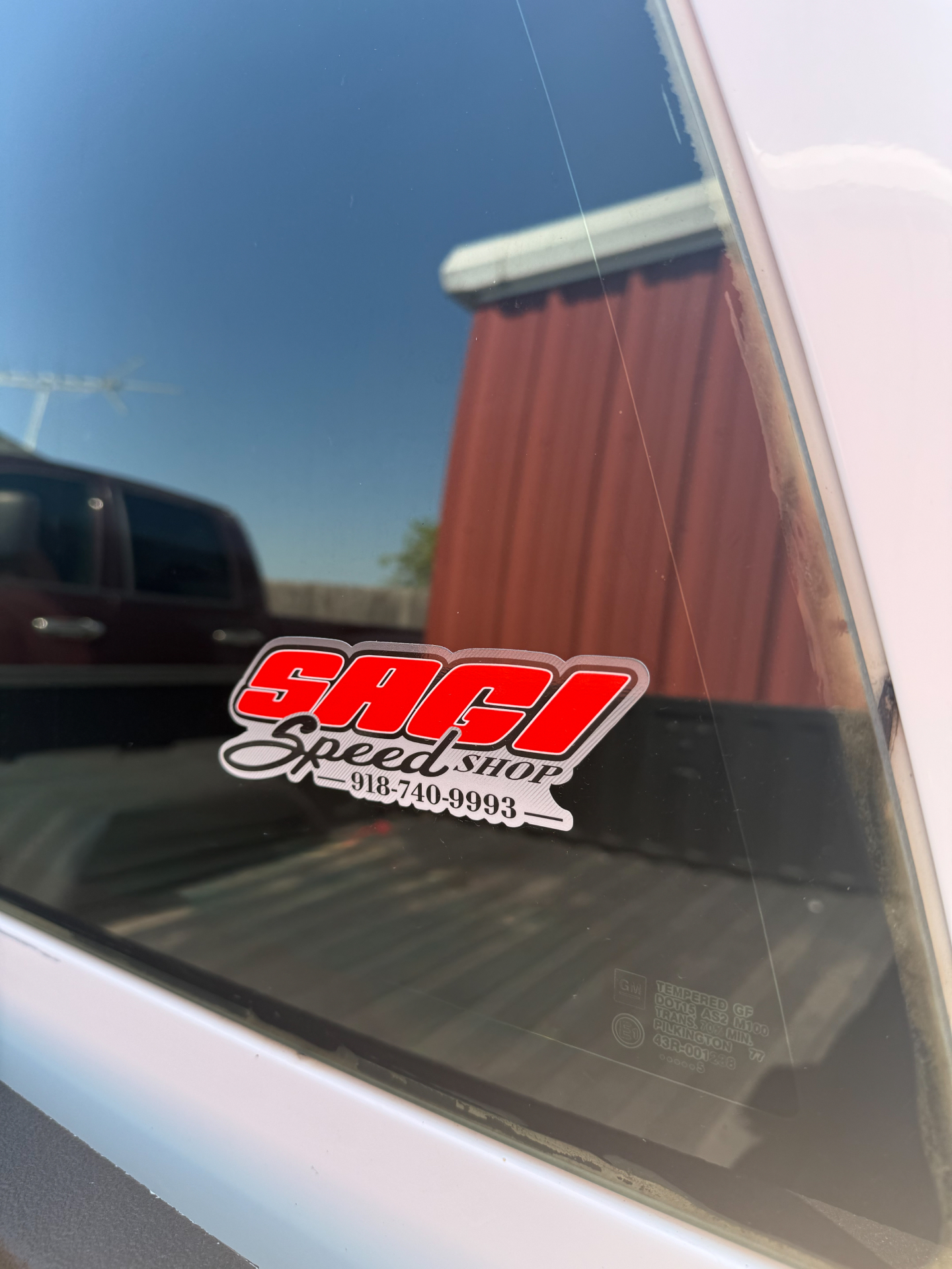 Sagi Speed Shop decal applied to a truck window